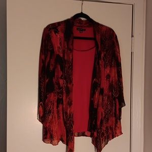 Sara Michelle blouse size XL.  Black and red in color.